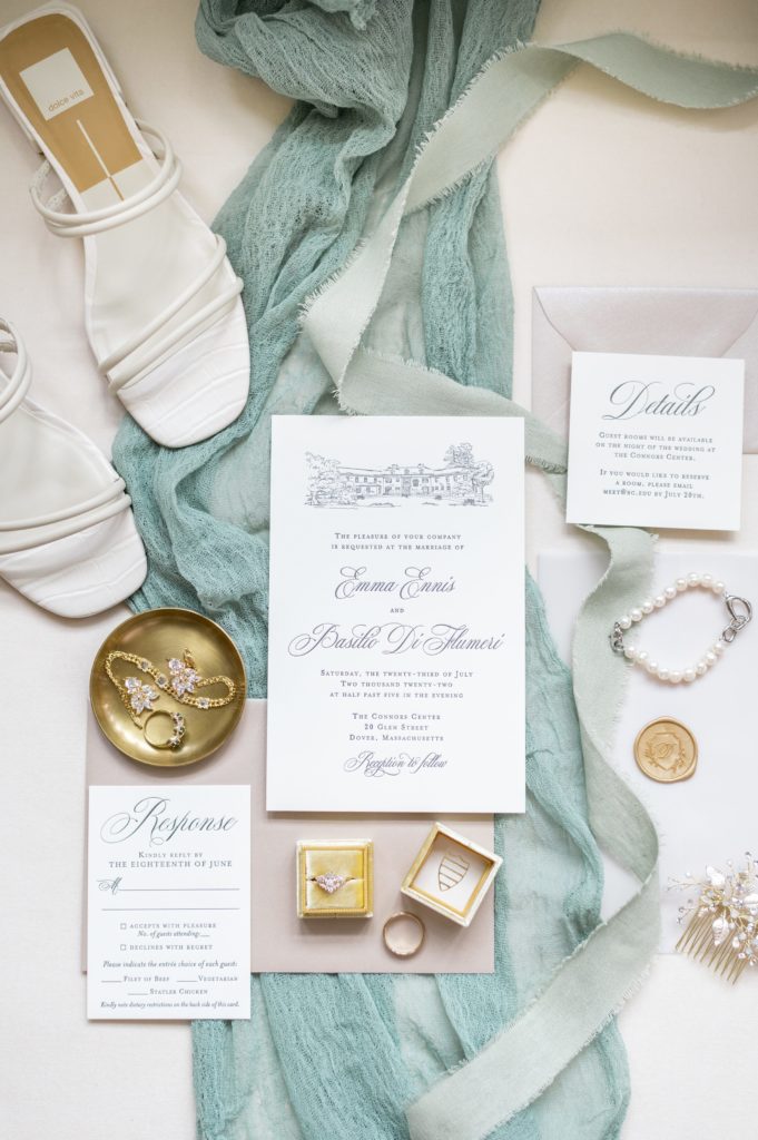 Detail photography of wedding invitation suite and accessories 