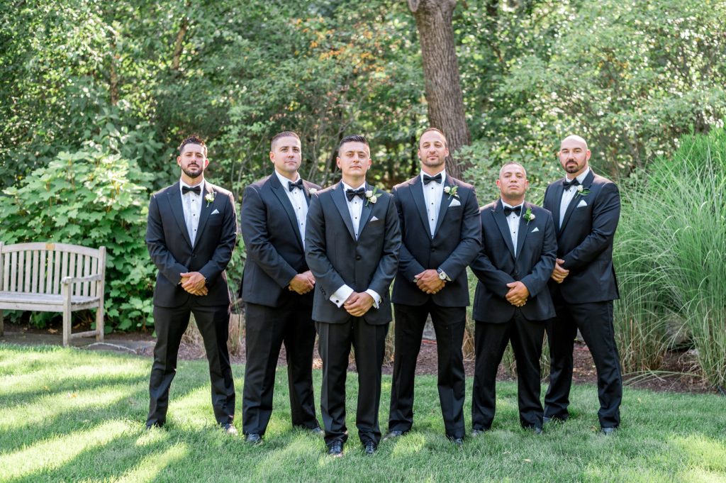 Summer outdoor groom and groomsmen portraits at the Connors Center 