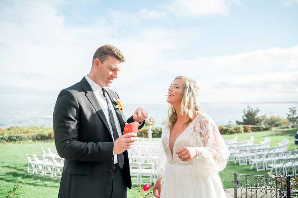 Bride and groom eating McDonald's fries before their ceremony