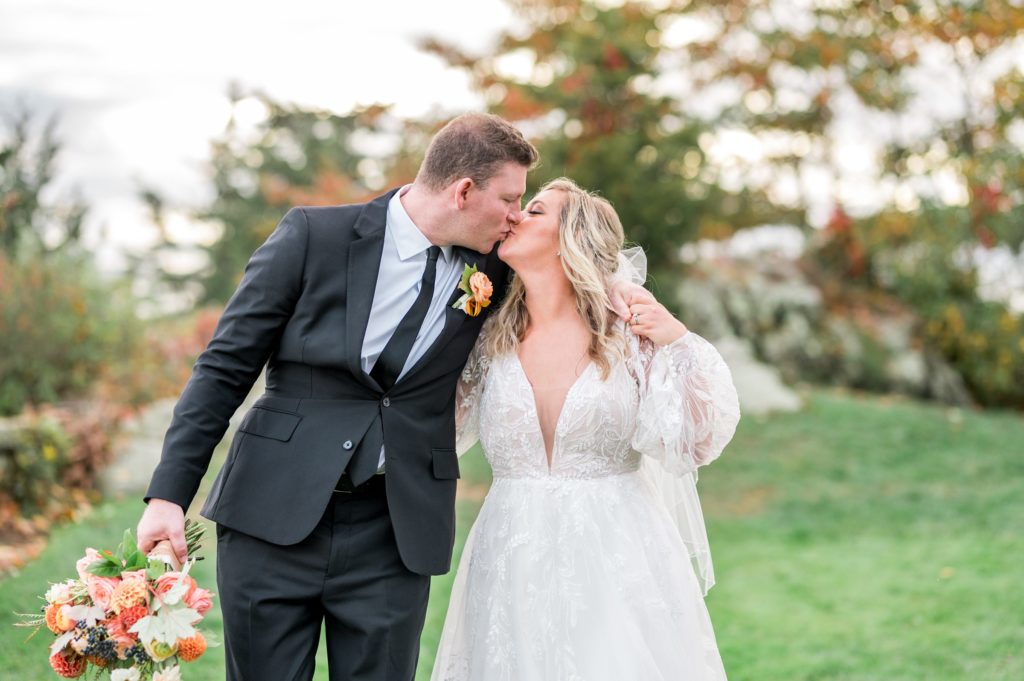 Bride and groom fall wedding day portraits at Misselwood Events at Endicott College 