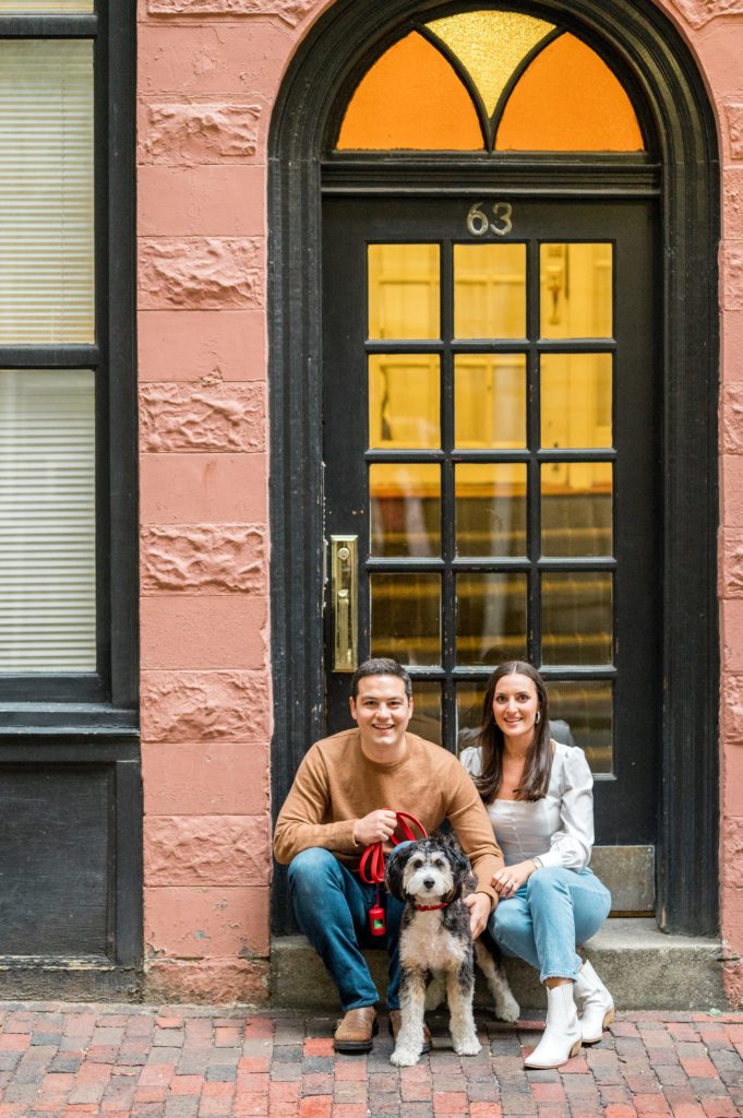 Beacon Hill engagement photos in doorway with their dog