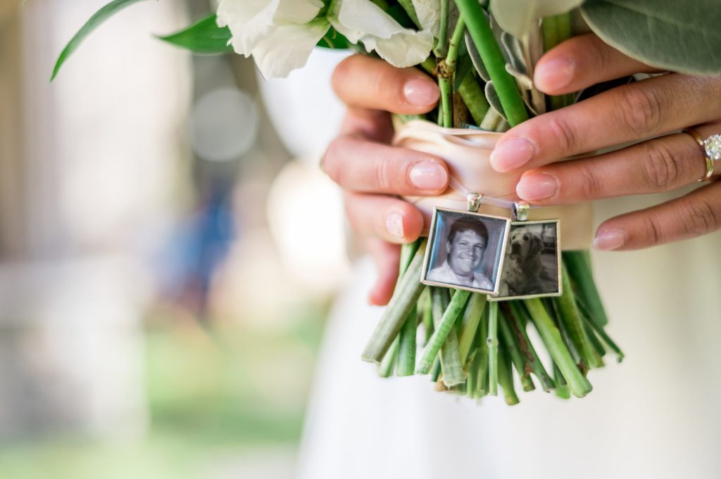 Remembrance photos on bride's bouquet 