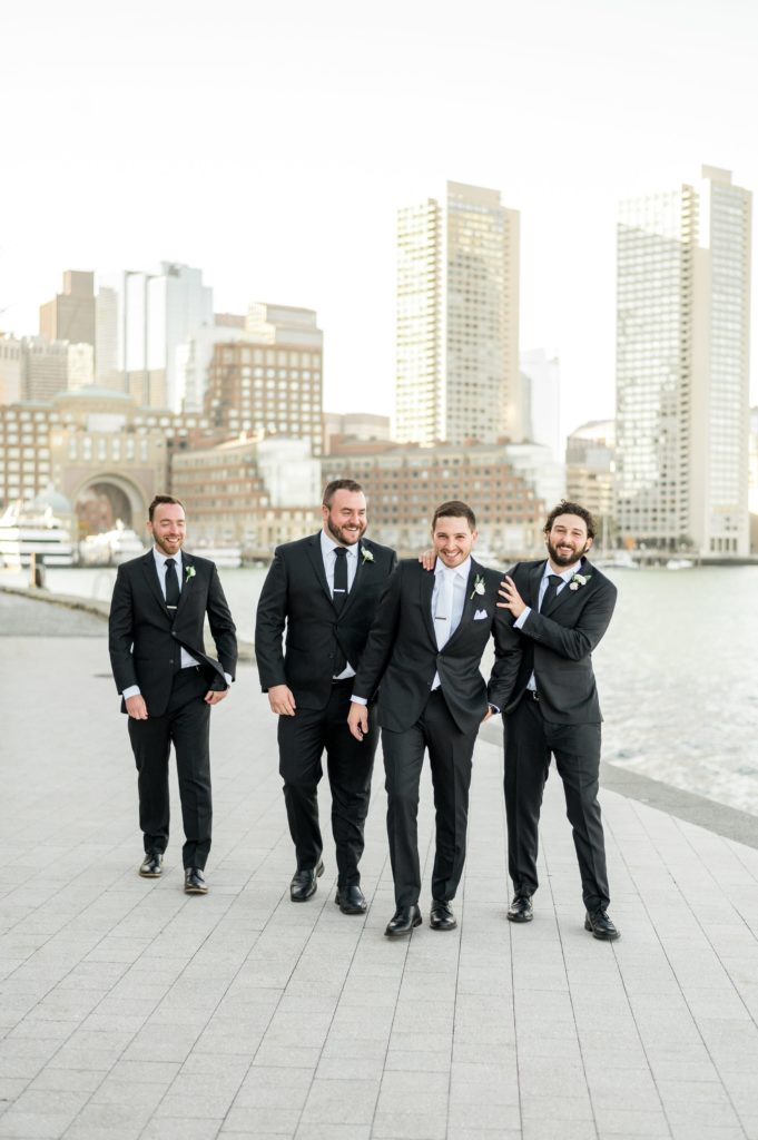 Groom and groomsmen portrait with Boston skyline 