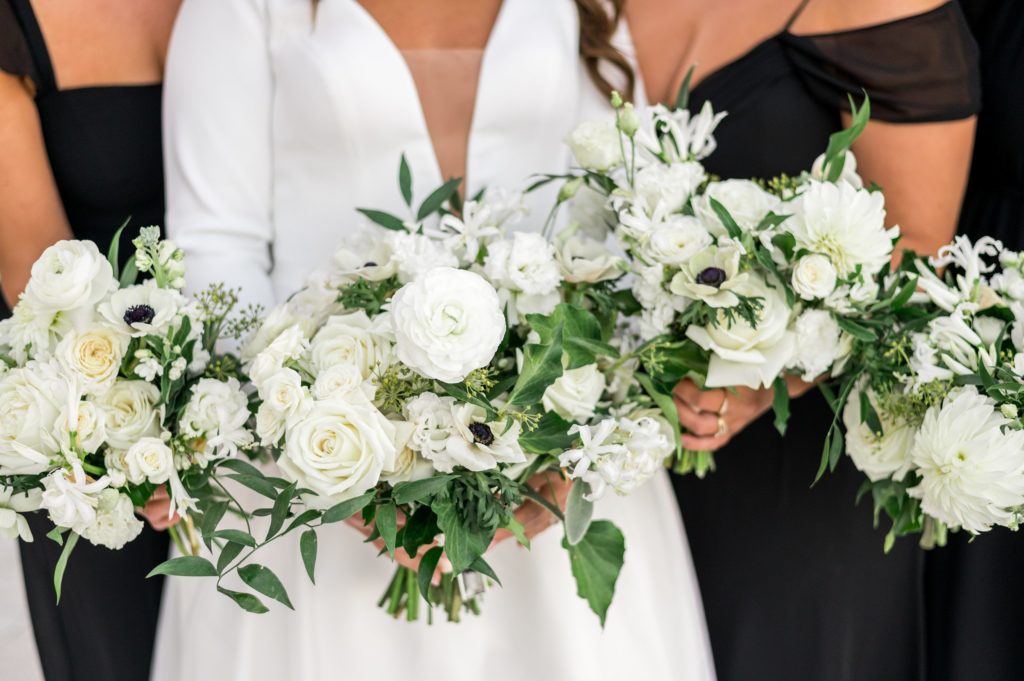 All white floral bouquets for Davio's Seaport Boston Fall Wedding