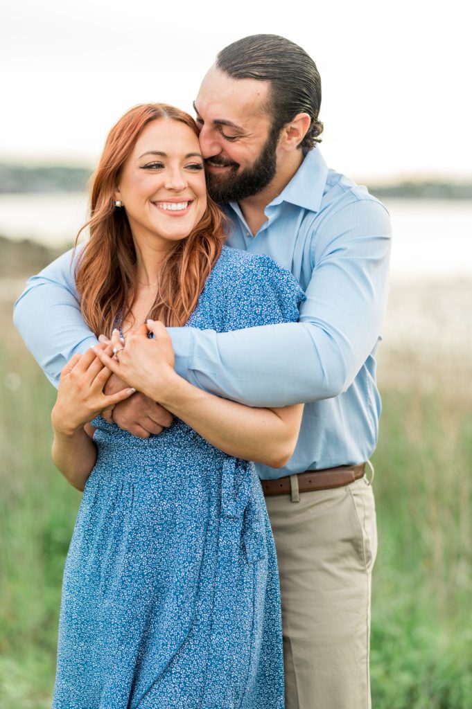 Couple matching blue outfits for engagement session