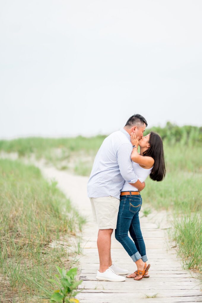 Couple kissing during Gloucester Beach Engagement Photos