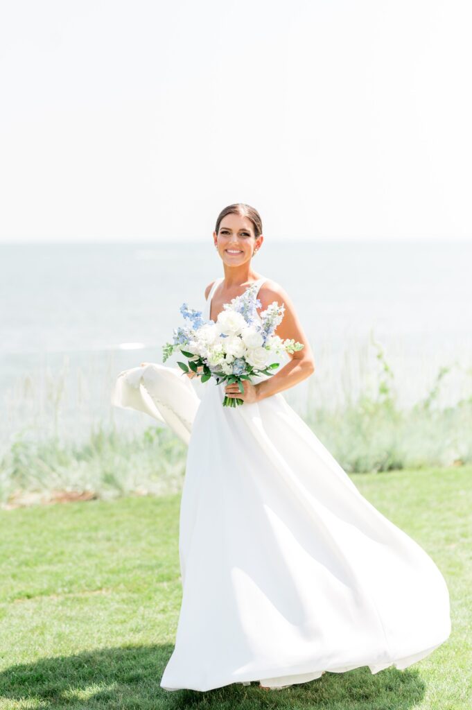 Bridal portrait with coastal bouquet at the Pelham House Resort on Cape Cod