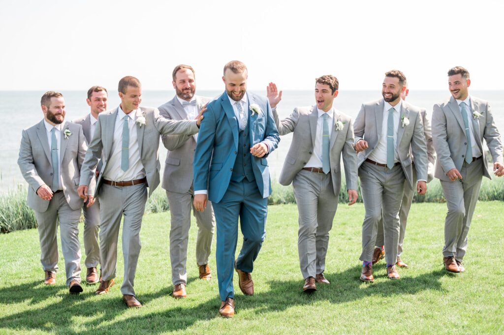Groom and groomsmen outdoor portrait for summer Cape Cod wedding