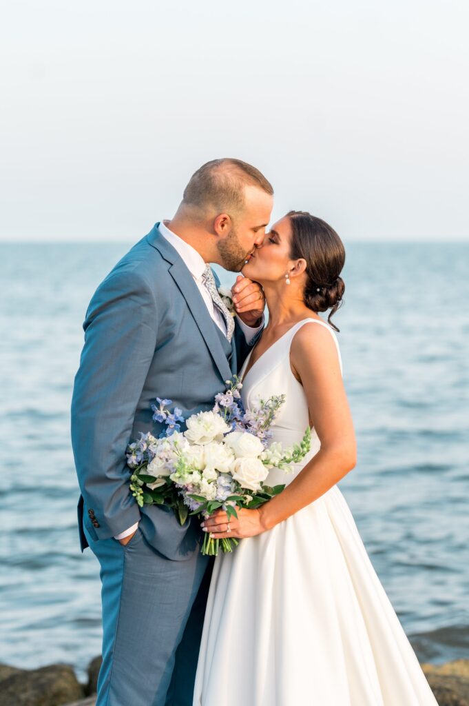 Bride and groom ocean view portrait at Pelham House Resort Cape Cod Summer Wedding