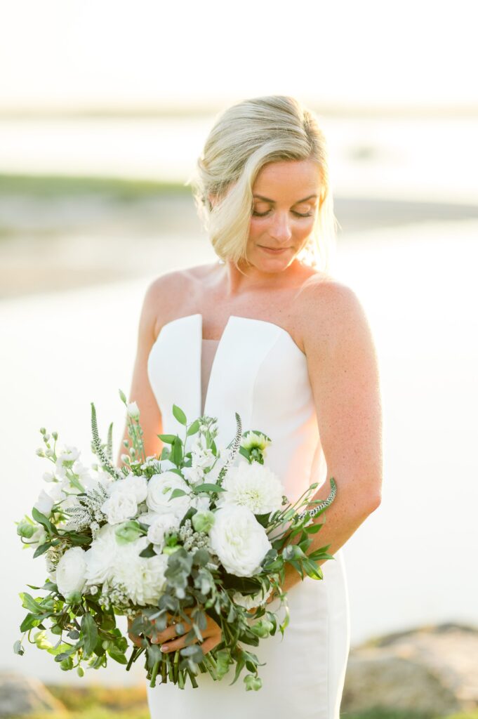 Beach bride photo at sunset during Cape Cod tented wedding
