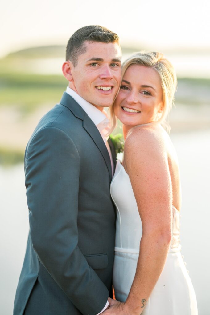 Sunset portraits of bride and groom during Cape Cod wedding