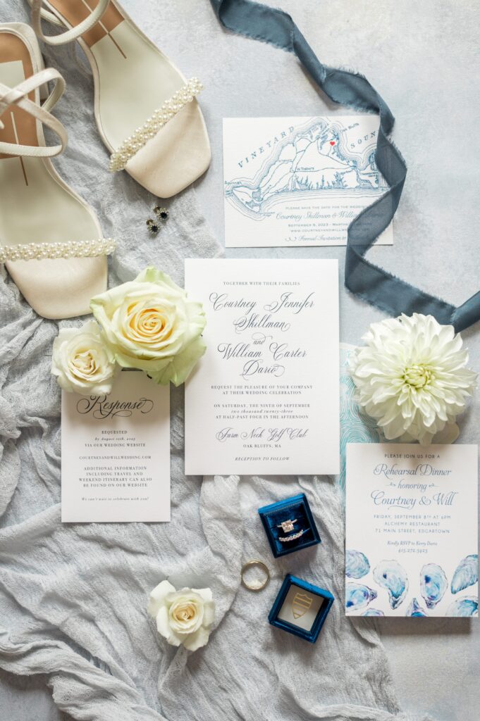 Flat lay detail photography of custom invitation suite for Martha's Vineyard Wedding