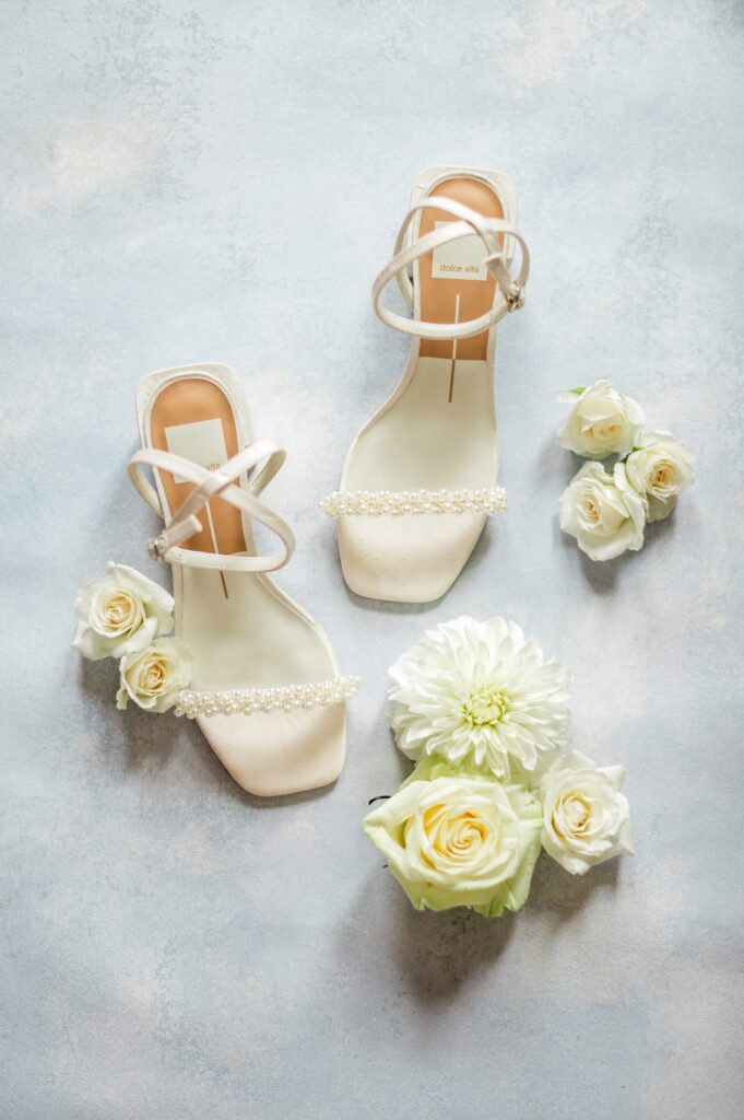 Bridal heels flat lay with pearl straps for coastal Martha's Vineyard Wedding