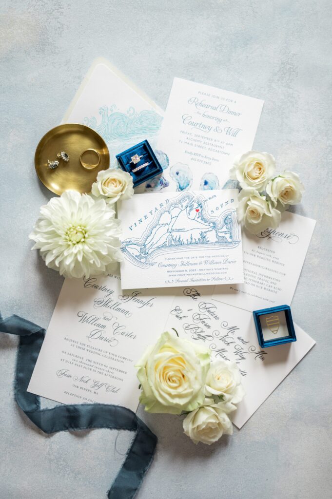 Flat lay detail photography of custom invitation suite for Martha's Vineyard Wedding