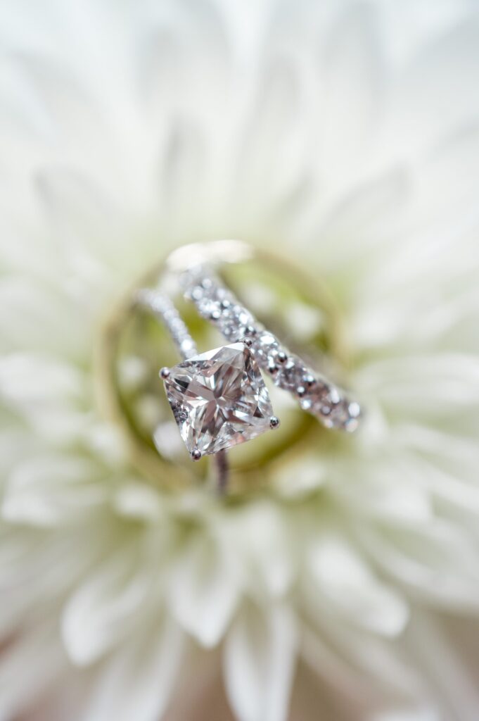 Engagement ring and wedding band detail photography