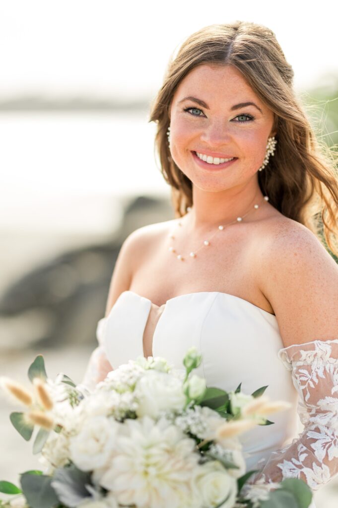Bride's natural looking makeup with a smokey eye for Rhode Island beach wedding 