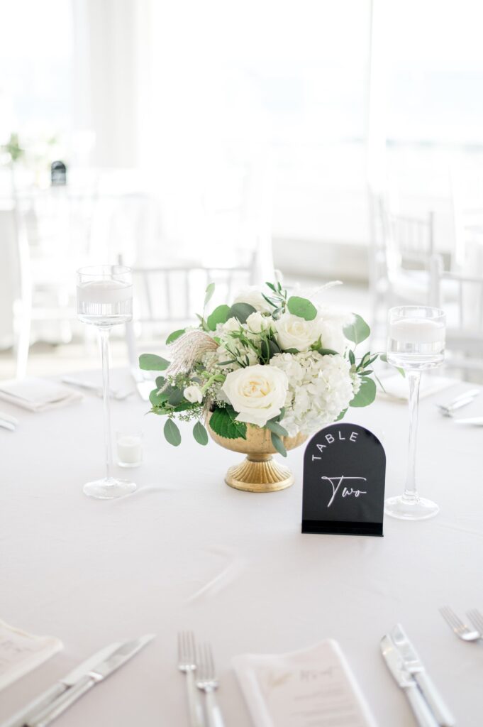 Table decor for Newport Beach House wedding with black and white color scheme 