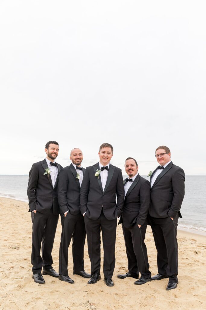 Groom and groomsmen portrait on the beach for Cape Cod wedding