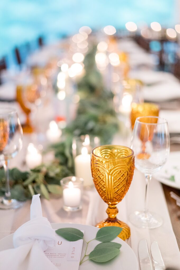 Table setting for Cape Cod backyard wedding with menu cards