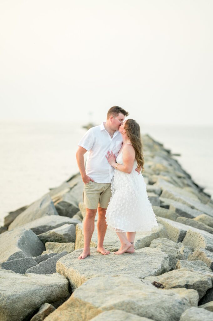 Engagement photos on the breakwater in Dennis, MA