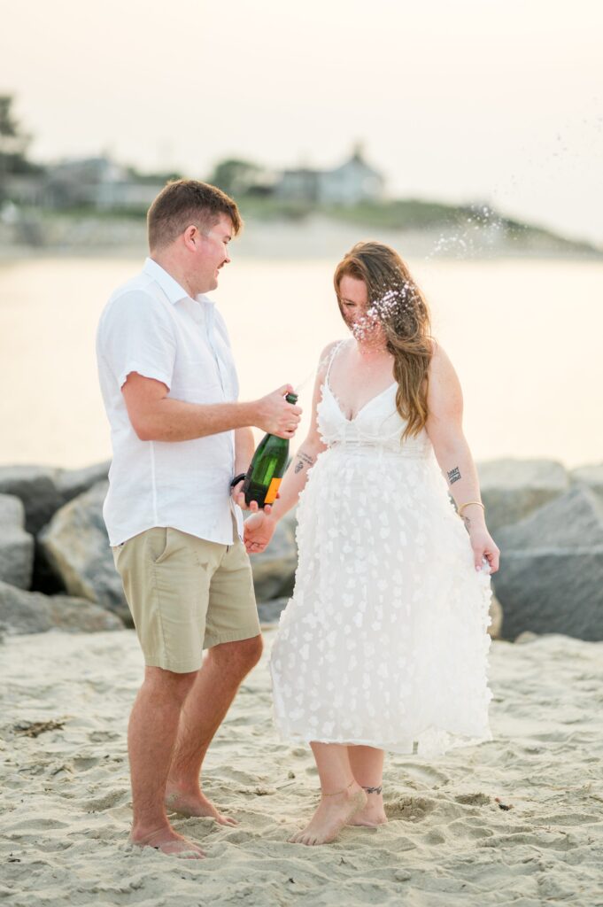 Tips for engagement photos bring champagne as a prop