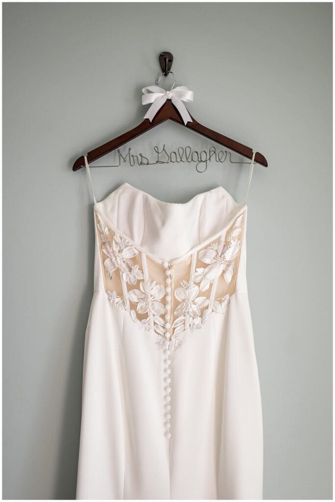 Custom floral art painted on Bride's gown