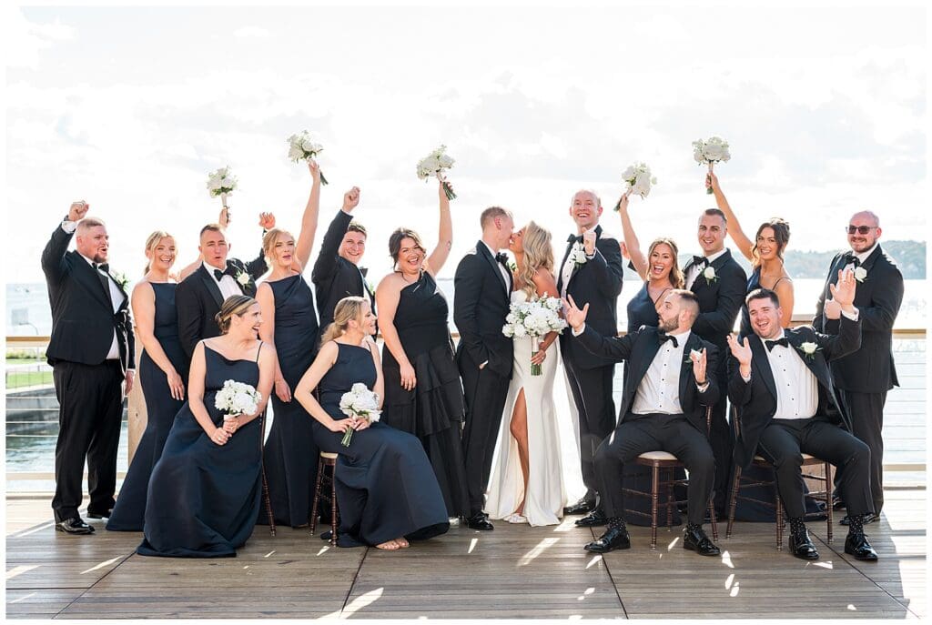 Bride, Groom & Wedding Party celebrating at The Beauport Hotel in Gloucester Massachusetts