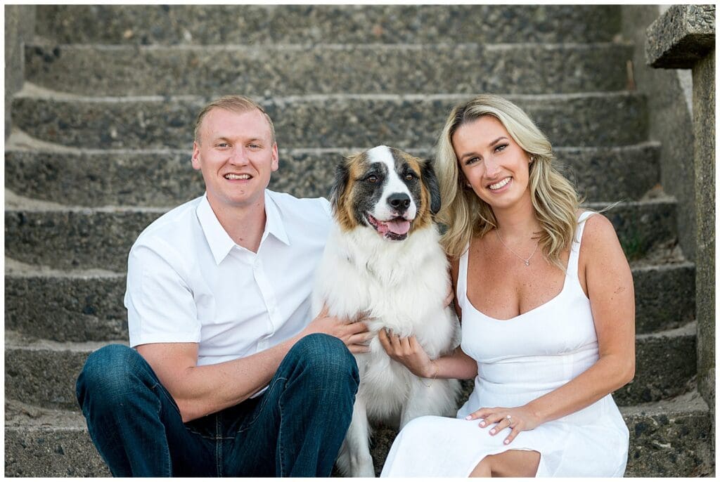 Engaged couple with their dog