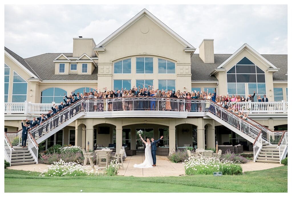 Exterior view of Indian Pond Country Club with all the wedding guests