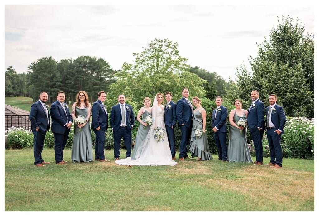 Full wedding party on the lawn at Indian Pond Country Club.