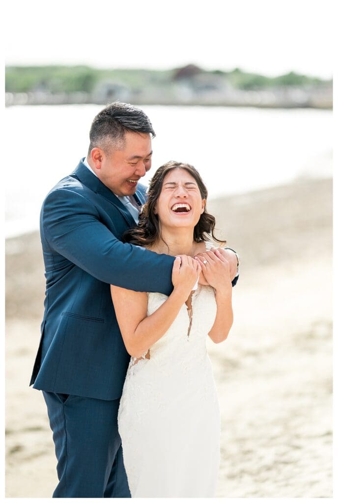 Beauport Wedding Photography: Candid portrait of the couple laughing together outside The Beauport Hotel.