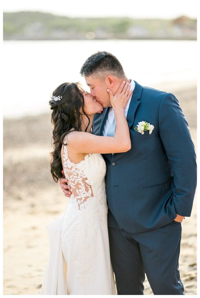 Romantic close-up of the couple framed by The Beauport Hotel’s iconic beach.