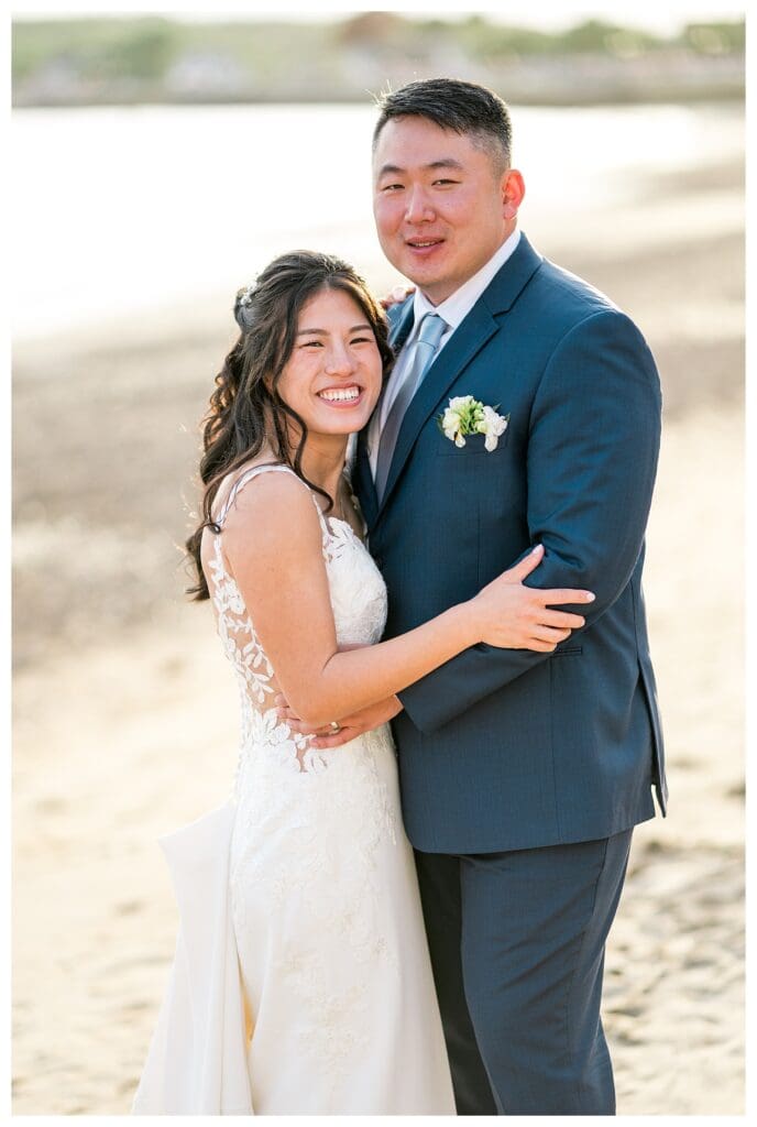 Sunset wedding portraits on the waterfront at The Beauport Hotel.
