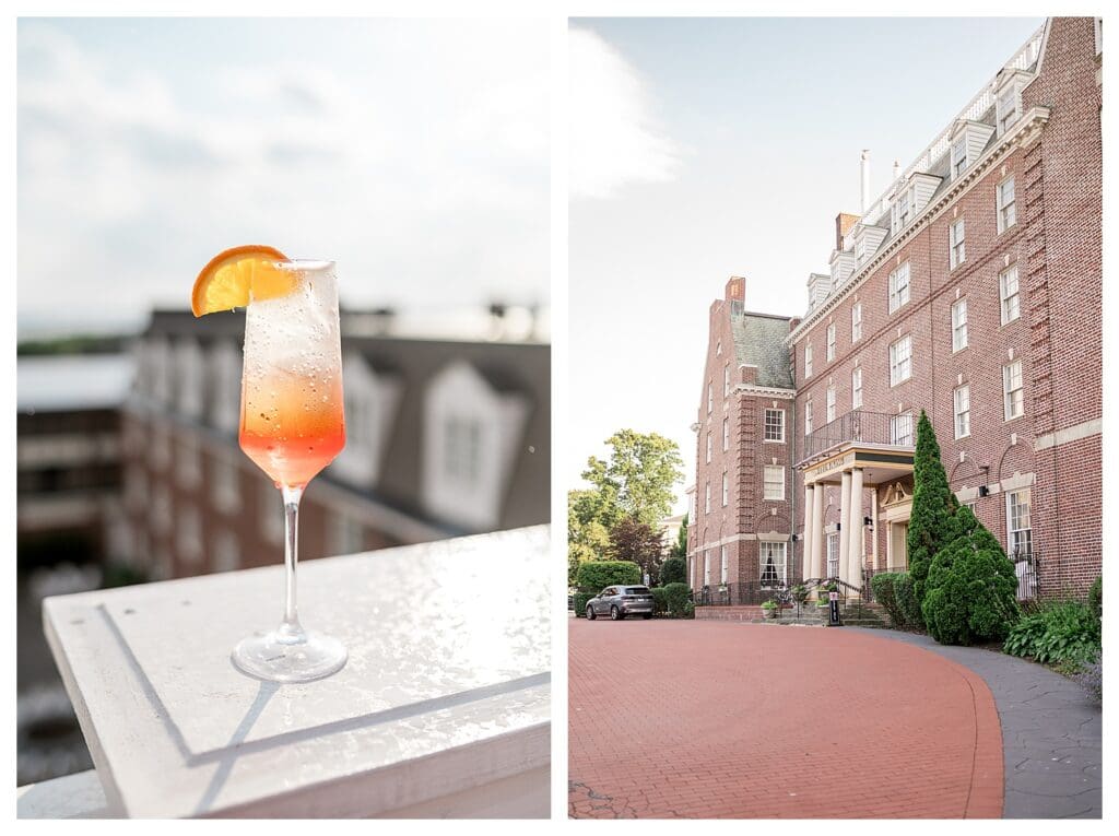 An Aperol Spritz garnished with an orange slice on a rooftop ledge at Hotel Viking.