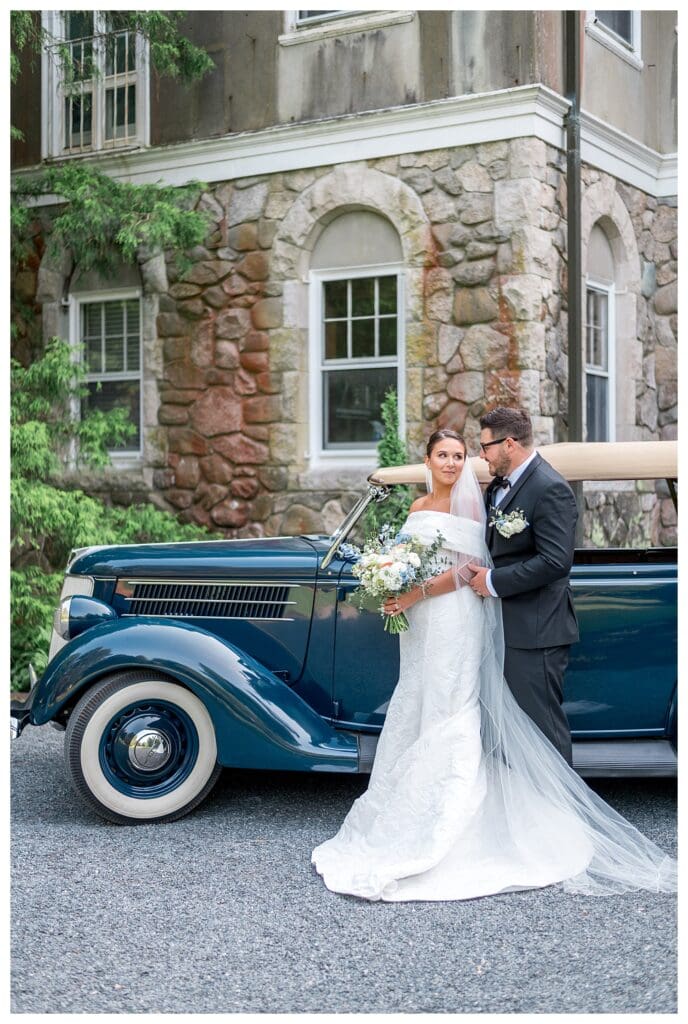 Bride and Groom with a vintage car at Blithewold Manor: New England Wedding Photographer