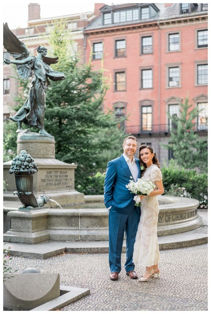 Couple by the fountain in the Boston Public Garden.