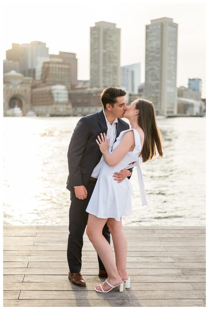 Romantic kiss along the Boston Harborwalk.
