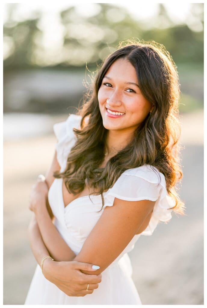 Izzy posing gracefully on the sand at Lynch Park.