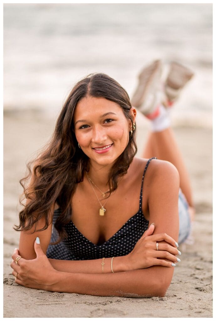 Close-up of Izzy with the ocean in the background.