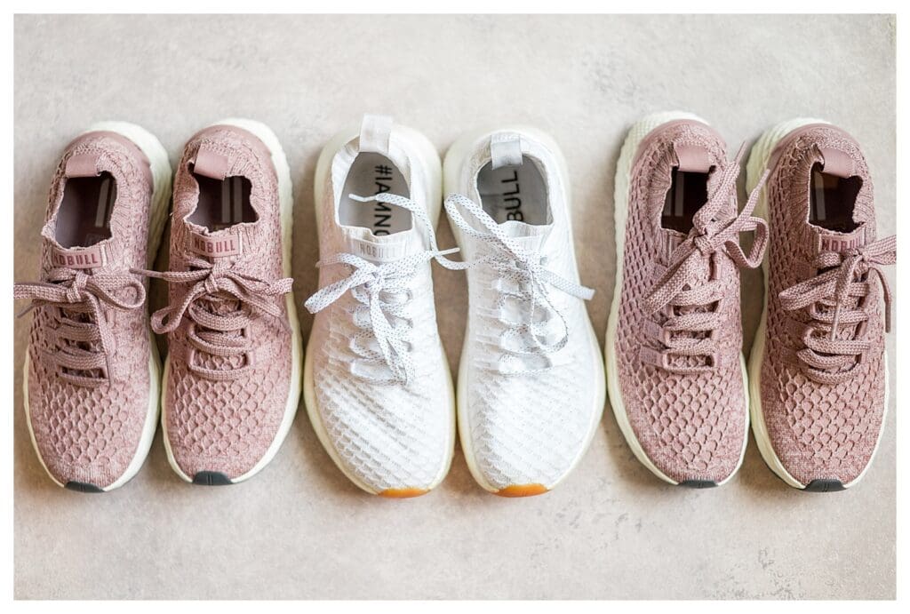 Close-up of the bride’s and bridesmaids’ matching Nobull wedding sneakers.