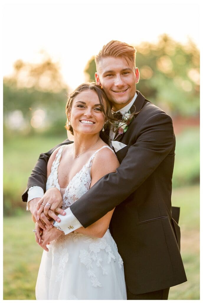 Bride and groom posing at Danversport Yacht Club wedding.