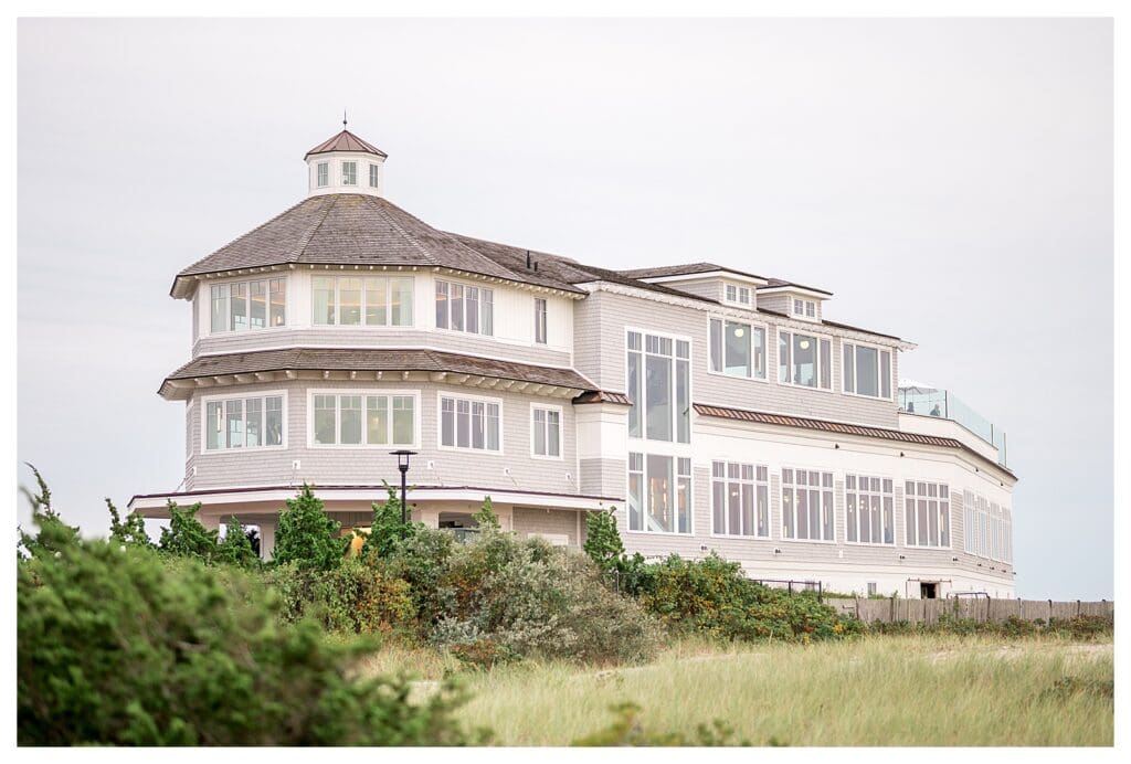 The Dune building at Wychmere Beach Club during golden hour.