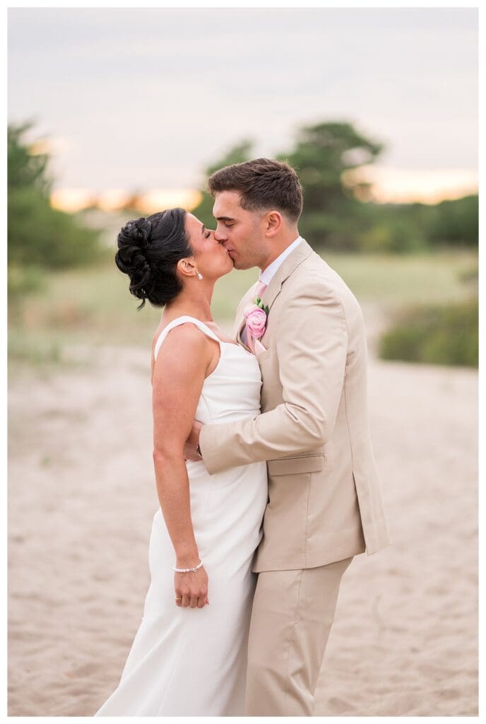 Couple kissing along the dune pathway at Wychmere.