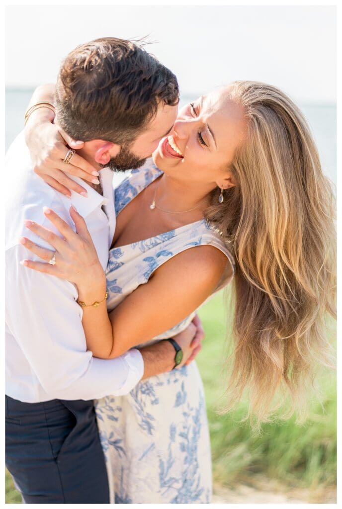 Reid and Libby laughing together after the proposal in Yarmouth