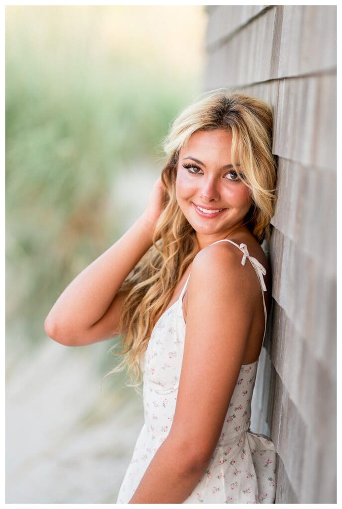 Classic coastal senior photos taken in Cohasset, MA at golden hour