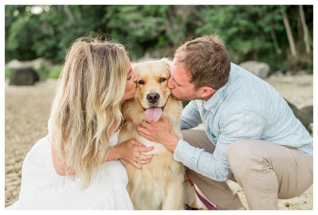 Couple kissing their golden retriever, Morgan, during a Cape Cod engagement session
