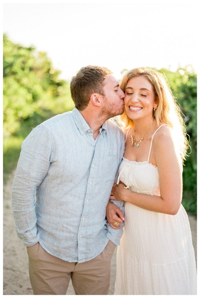 Close-up of Jess and Jamie holding each other during their engagement session at The Knob
