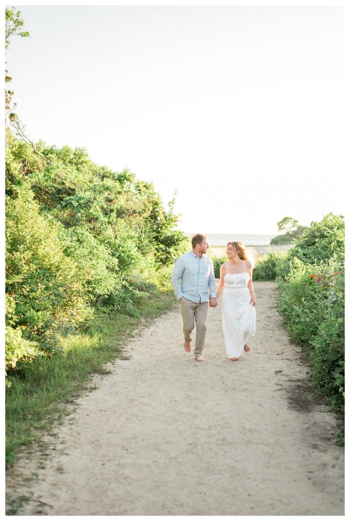 Romantic golden hour portrait of a couple at The Knob in Falmouth, Massachusetts