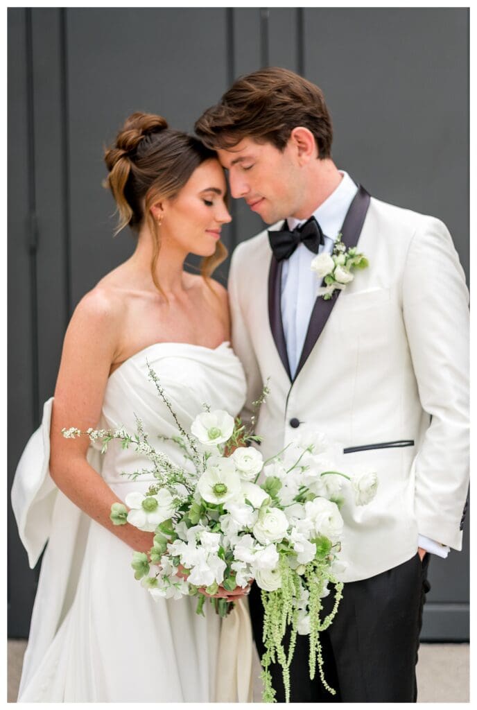 Bride and groom sharing an intimate moment at Monserate Winery