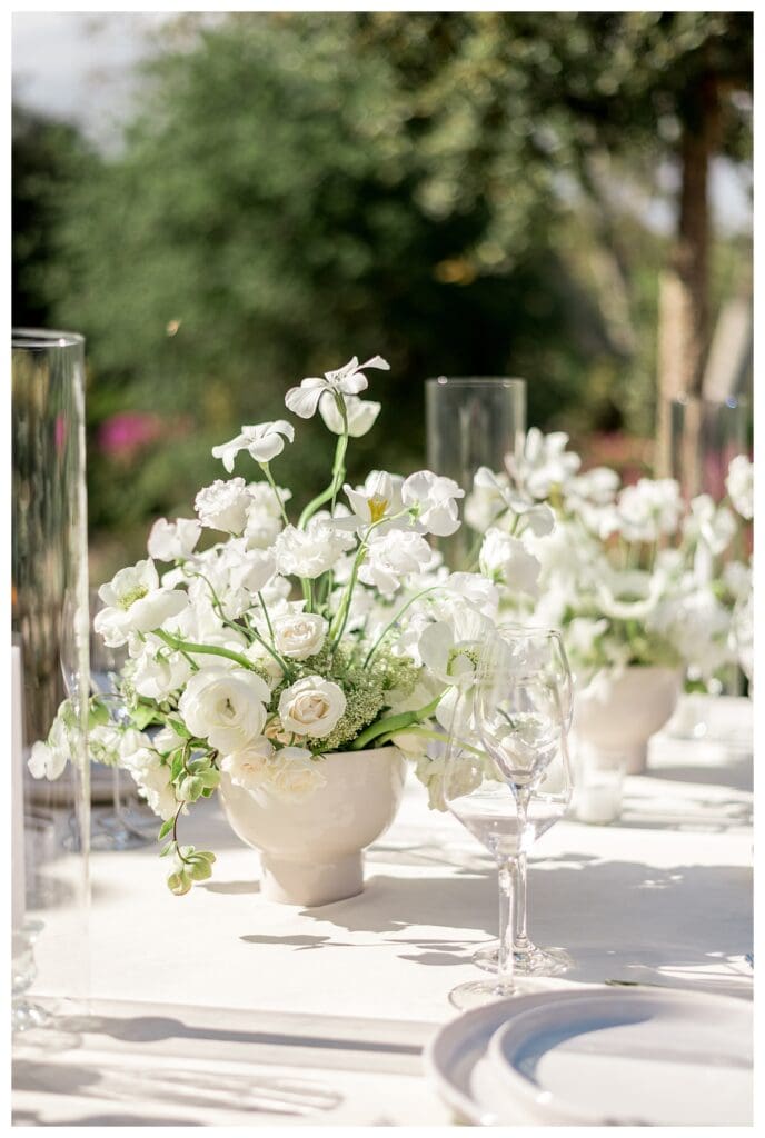 Outdoor wedding reception tables set under trees at Monserate Winery in California